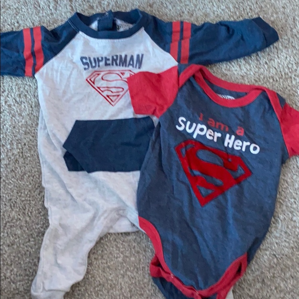 2 Superman branded baby one pieces! Like new!